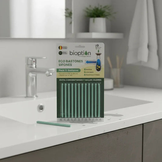 Trini Vital Store ECO BASTONES Bioption para limpieza de sifones en empaque verde sobre lavabo de baño moderno